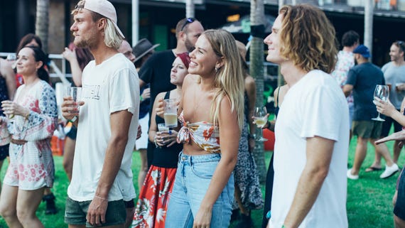 Emily Hutchinson and friends dancing at The Precinct beer garden at the Darwin Waterfront