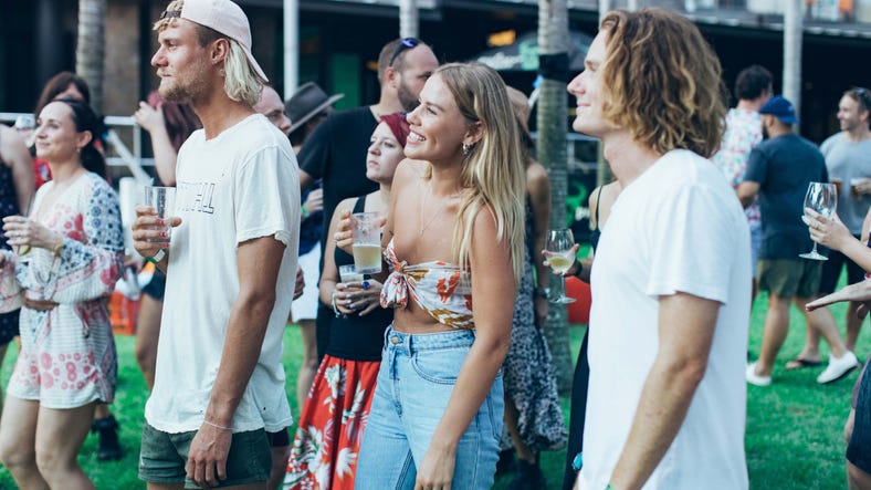 Emily Hutchinson and friends dancing at The Precinct beer garden at the Darwin Waterfront