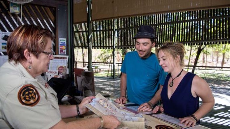 couple getting information from a park ranger at bowali visitor centre in kakadu.jpg