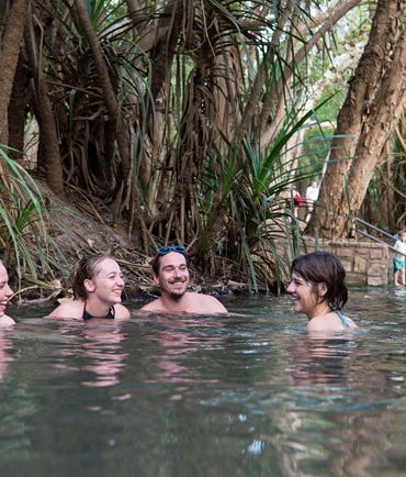 Friends swimming together at Katherine Hot Springs