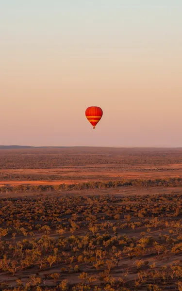 Hot air balloon mid-air near Alice Springs