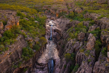 An aerial view of a waterfall in Kakadu National Park