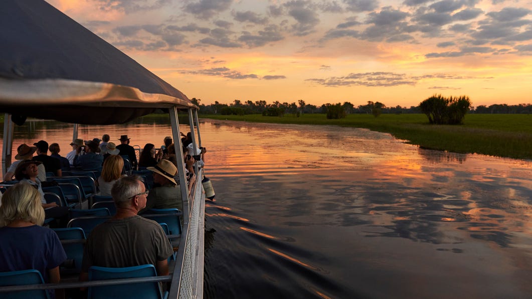 Tourist group on a cruise viewing the sunrise