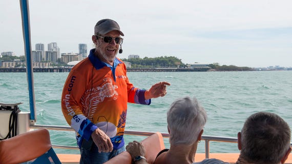 Sea Darwin Presentor speaking more about the Bombing of Darwin while on a cruise