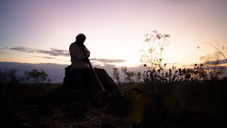 Man playing the didgeridoo