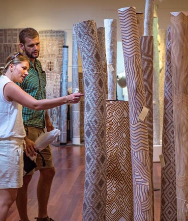 Couple looking at aboriginal art at Buku Larrnggay Mulka Arts Centre