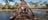 Travellor's_crossing_the_bridge_at_Lake_Mary_Ann.jpg