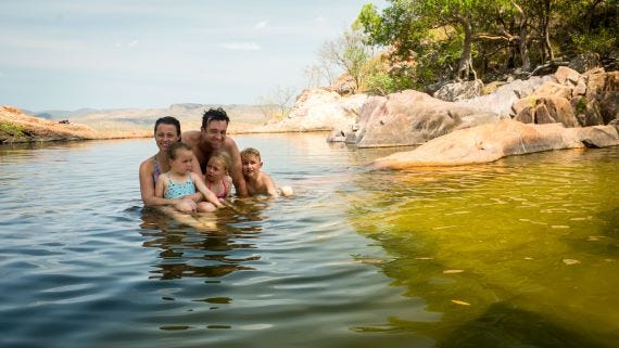 Family at the Infinity Pool in Kakadu at Gunlom