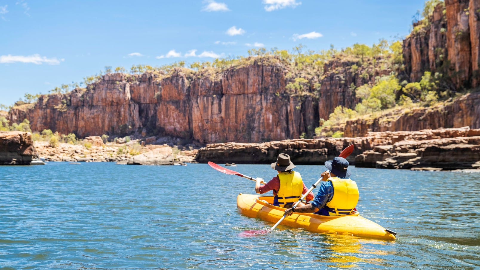 Two people canoeing Nitmiluk Gorge