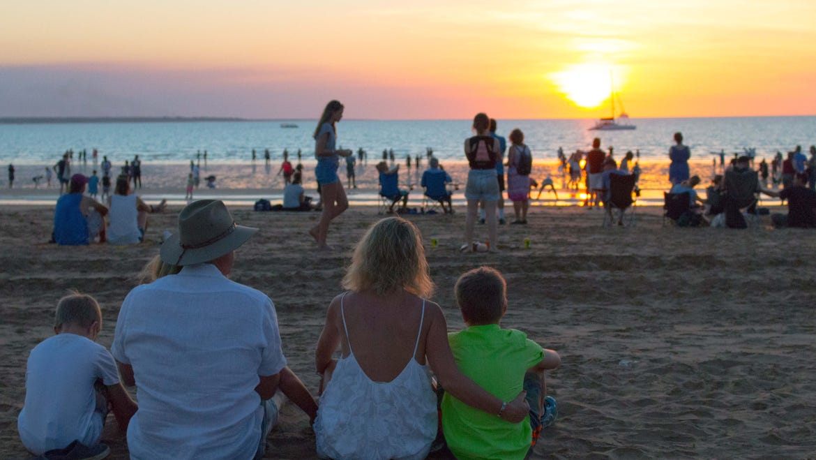 Matt Hayden and family watching the sun set at Mindil Beach Sunset Markets Darwin