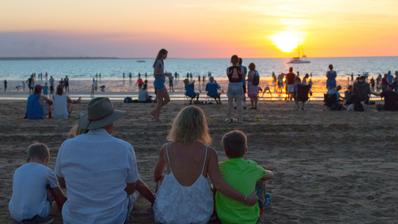 Matt Hayden and family watching the sun set at Mindil Beach Sunset Markets Darwin