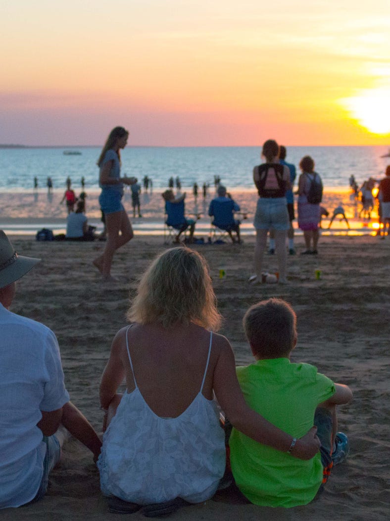 Matt Hayden and family watching the sun set at Mindil Beach Sunset Markets Darwin