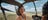 Woman smiling at camera during a helicopter flight over Litchfield National Park