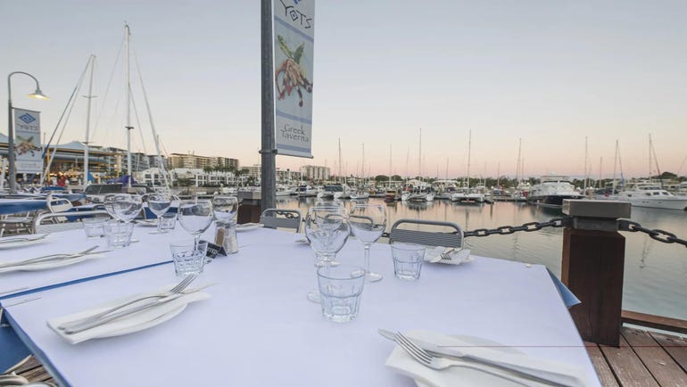ocean view seating at yots greek taverna in cullen bay marina