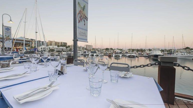 ocean view seating at yots greek taverna in cullen bay marina