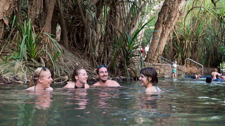Friends swimming at Katherine Hot Springs
